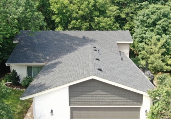 Front view of Savage MN home with new GAF Timberline HDZ Charcoal roof.