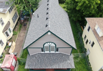 House & Garage Roof replacement project in Minneapolis drone shot of front of home