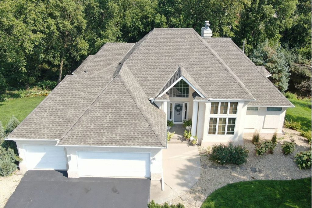 Front aerial shot of new GAF Timberline HDZ shingles on Plymouth home
