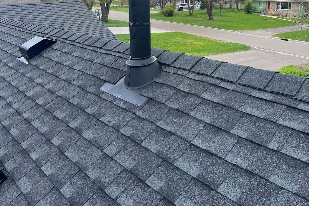 Close up of new furnace stack flashing on Minnetonka roof replacement